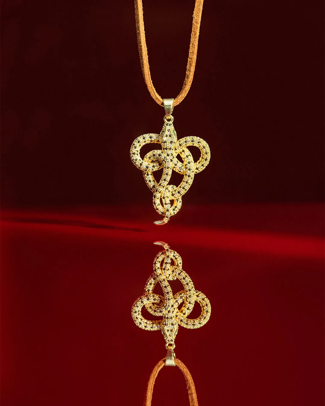 The Kourtney snake pendant